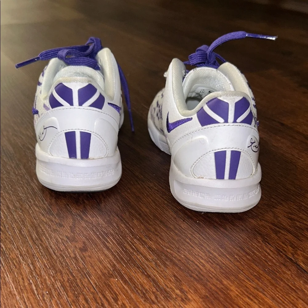 Boys Size 11 Nike Purple and White Kobe’s